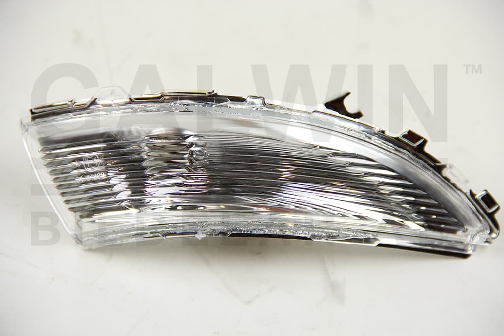 Sidoblinkers hö i spegel — Höger