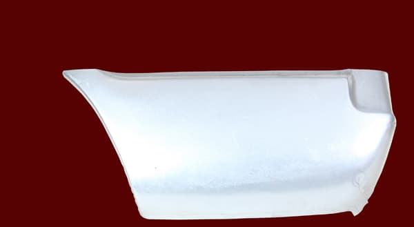 Sidoplåt bakom bakhjul