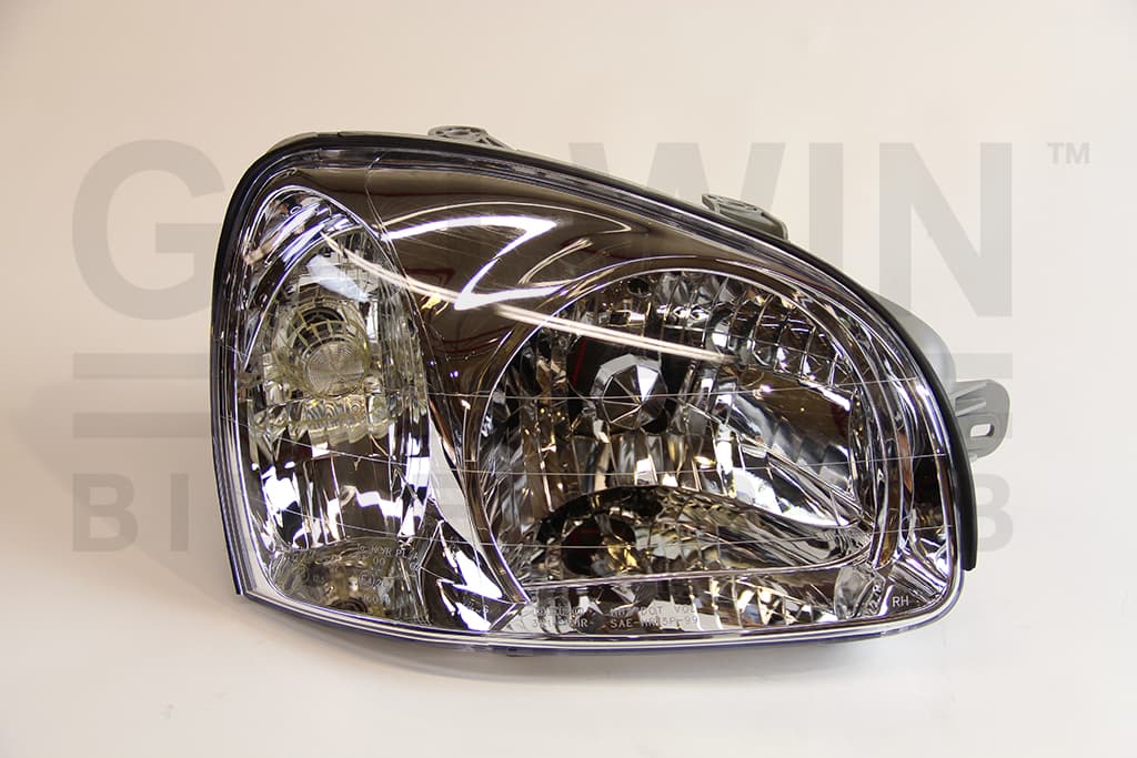 Strålkastare hö H4, för eljustering, grått hus, -03/2003 — Höger från Galwin