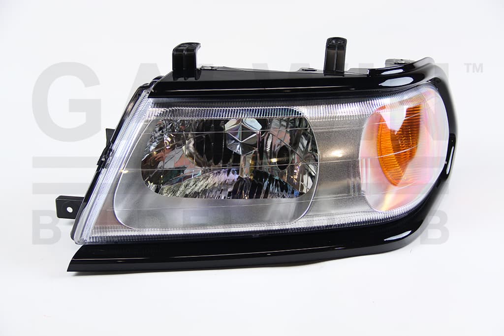 Strålkastare H4, eljustering utan motor, med svart ram 2006- från Galwin