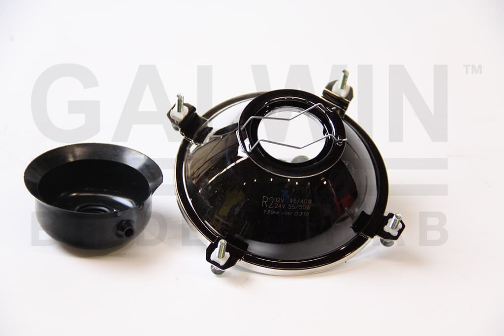 Strålkastare vä/hö rund R2 138mm fyra fästöron från Galwin